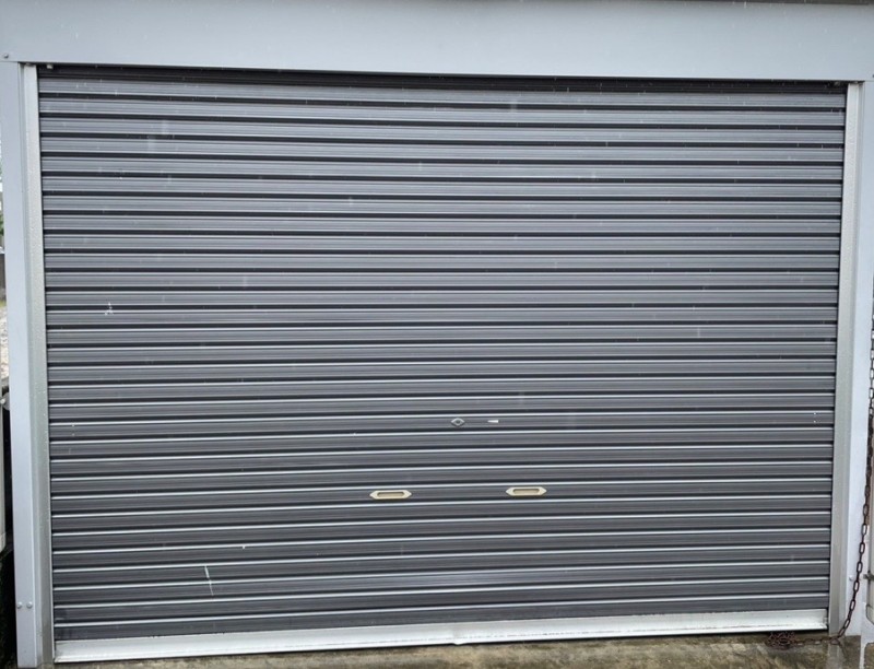 手動シャッター　スラット脱線解消作業