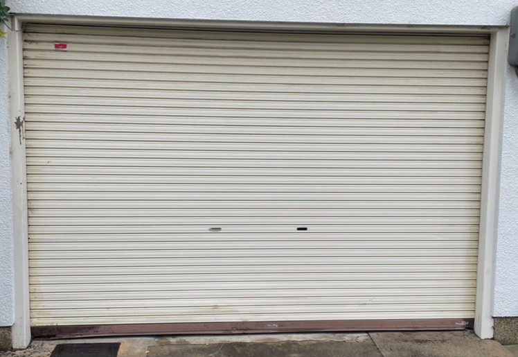 電動シャッター　スラット脱線復旧作業