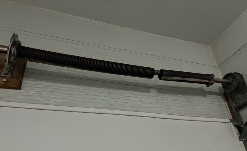 オーバードアシャッター　バネ交換工事