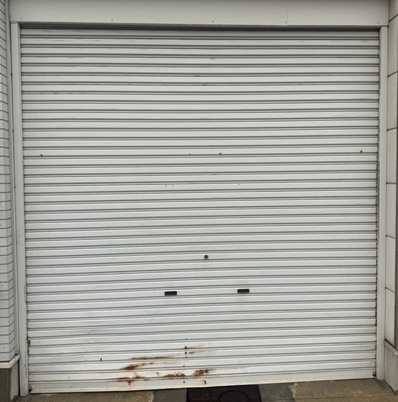 手動シャッター　スラット脱線復旧作業