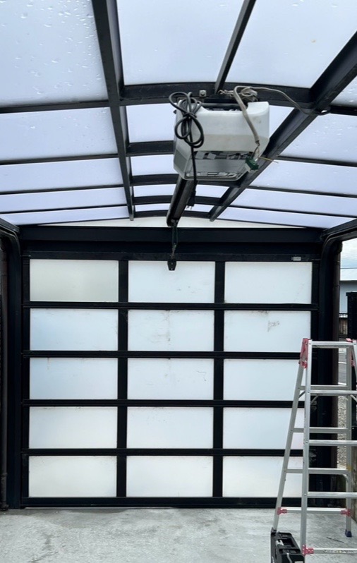 オーバードア　開閉機　交換工事