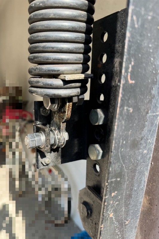 オーバードアシャッター　バネ修理作業