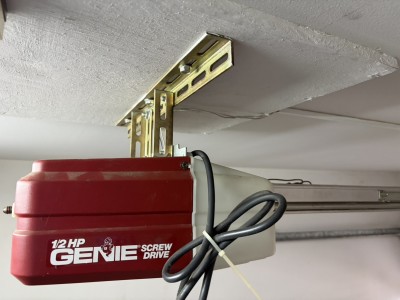 車庫　電動オーバードアシャッター　物を挟んだ　　パネル補修・開閉機交換