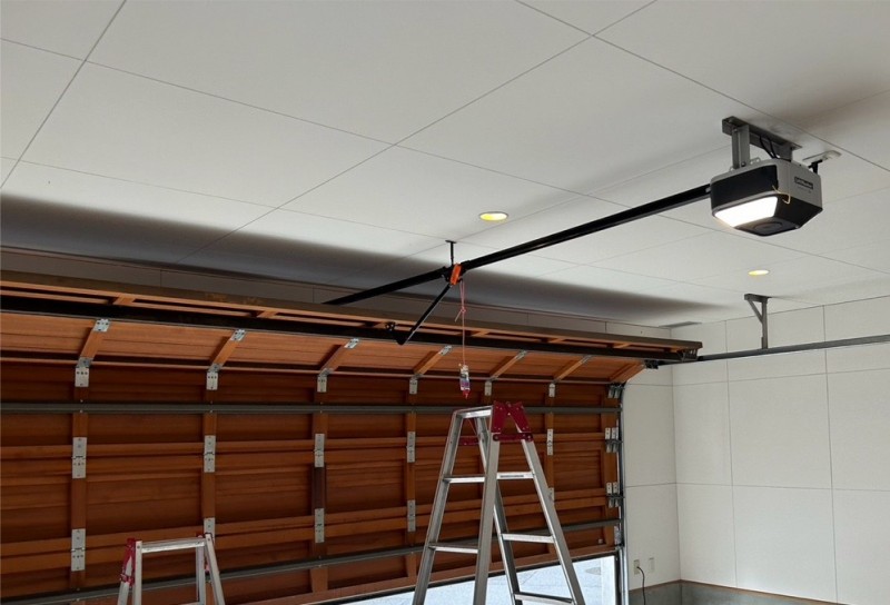 車庫　オーバードアシャッター　電動開閉機の交換工事