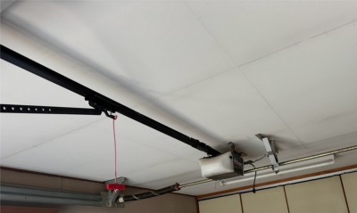 車庫　オーバードアシャッター　電動開閉機・ベルトの交換工事