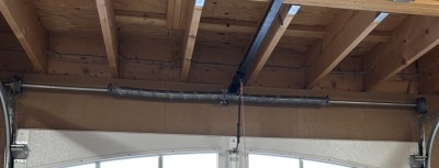 車庫　オーバードアシャッター　バネ・開閉機ギア　交換工事