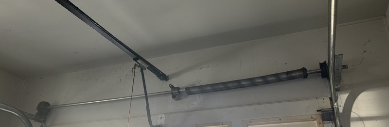 車庫　電動オーバードアシャッター　バネ交換