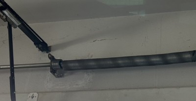 車庫　電動オーバードアシャッター　バネ交換