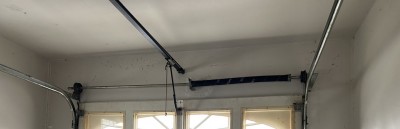 車庫　電動オーバードアシャッター　バネ交換