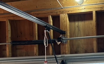 車庫　電動オーバードアシャッター　バネ交換