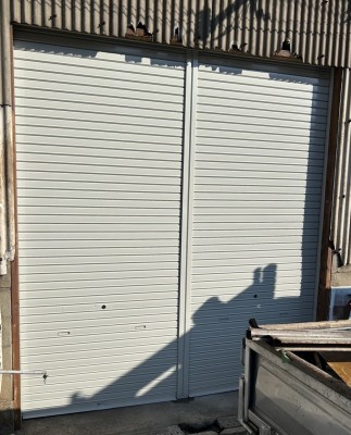 倉庫　手動シャッター　交換工事