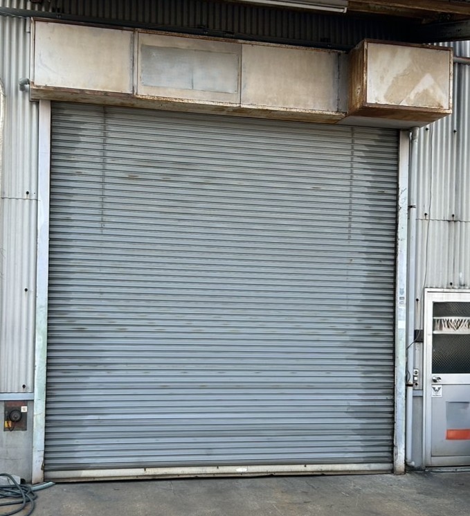 倉庫　非常電源装置付き　電動シャッター　交換工事　